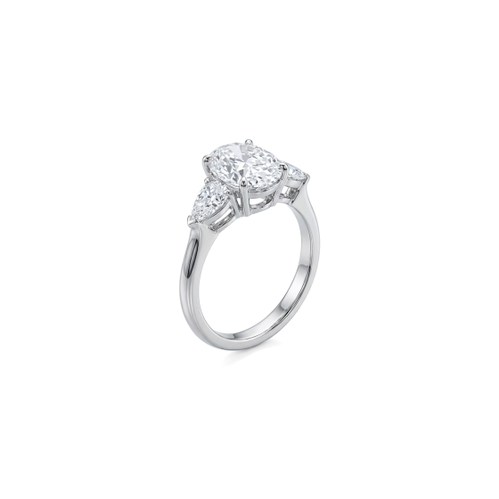 White gold oval center stone halo three-stone ring